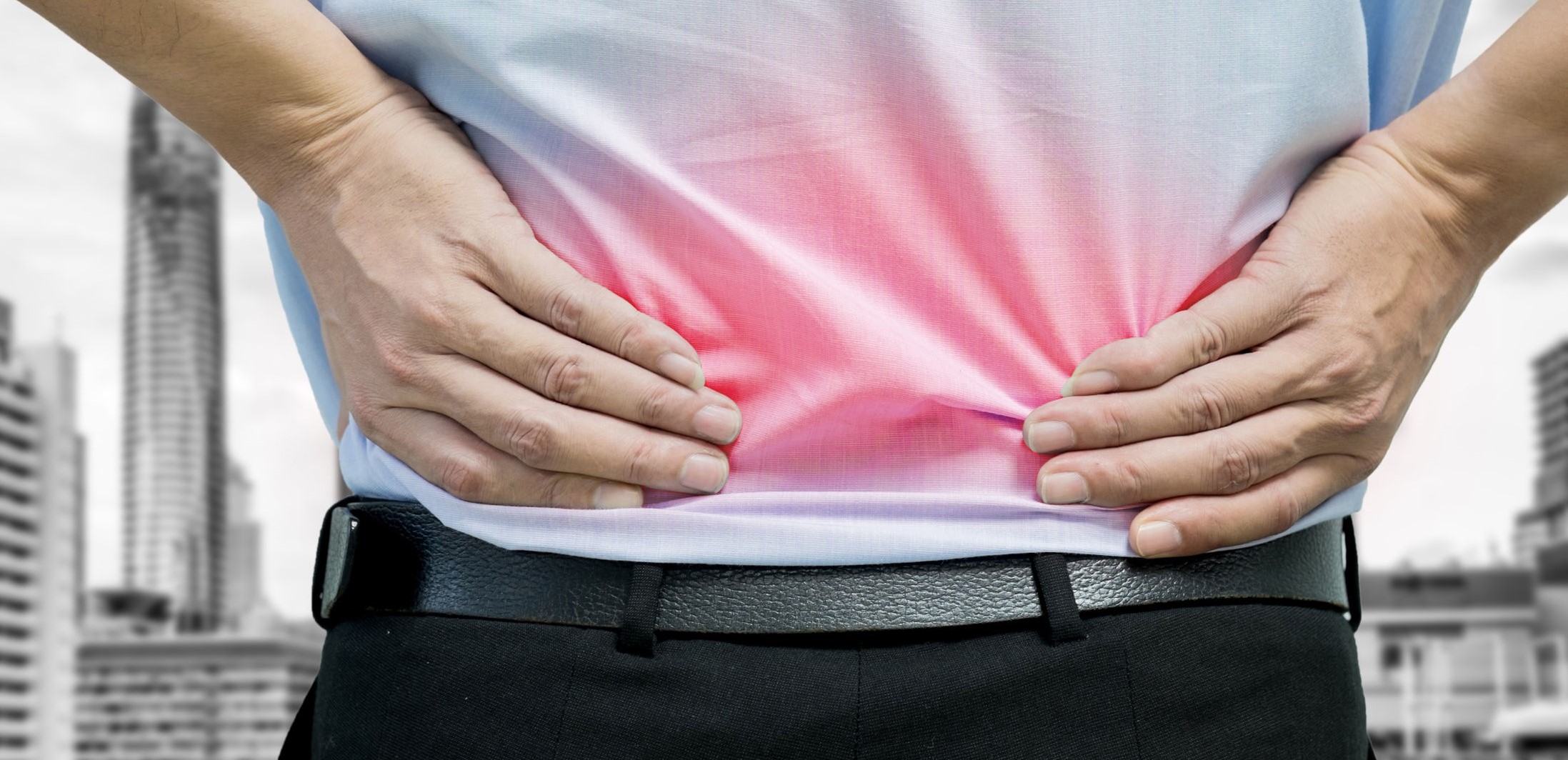 Man feeling back pain